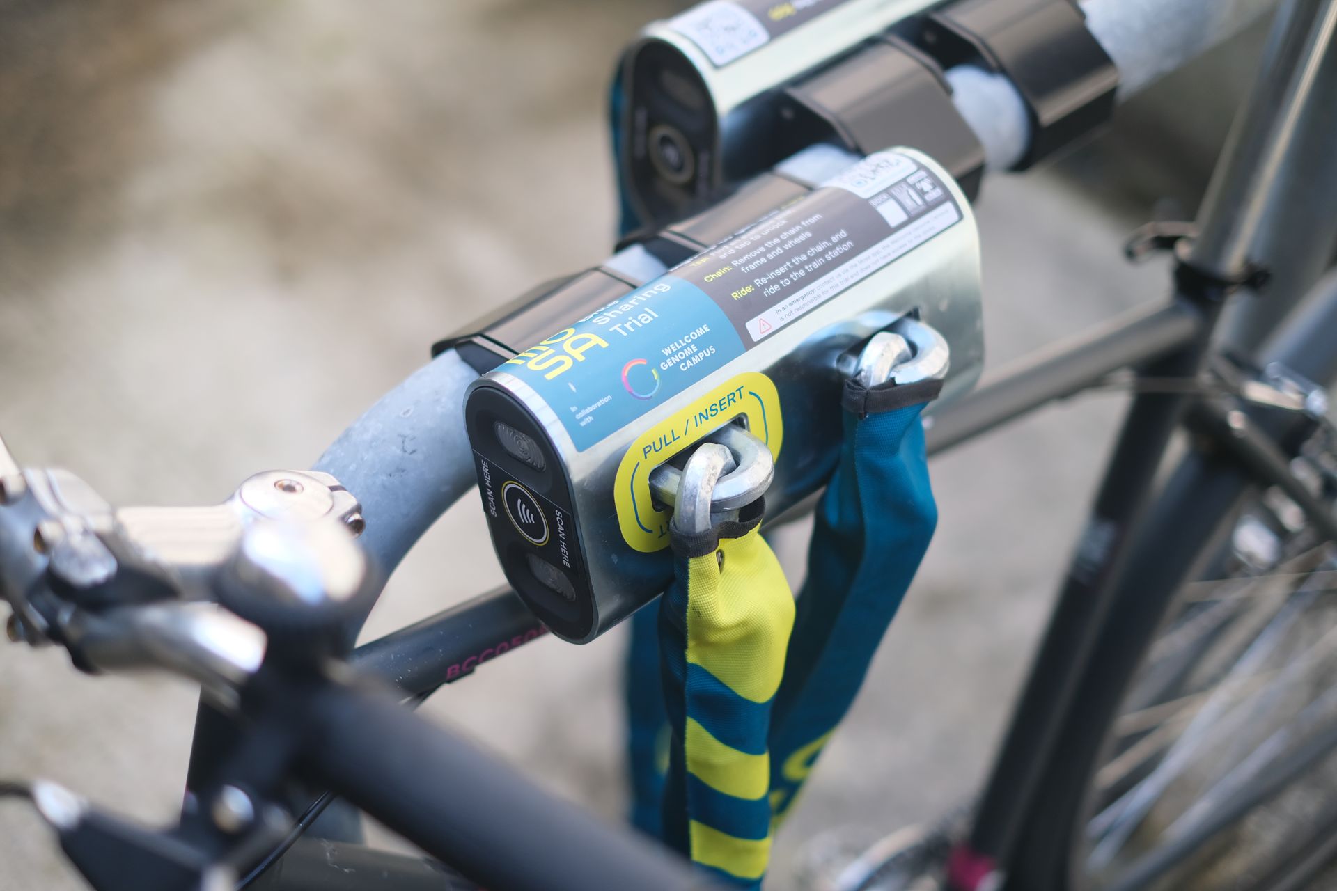 A Mosa smart lock mounted on a bike frame during a bike-share trial